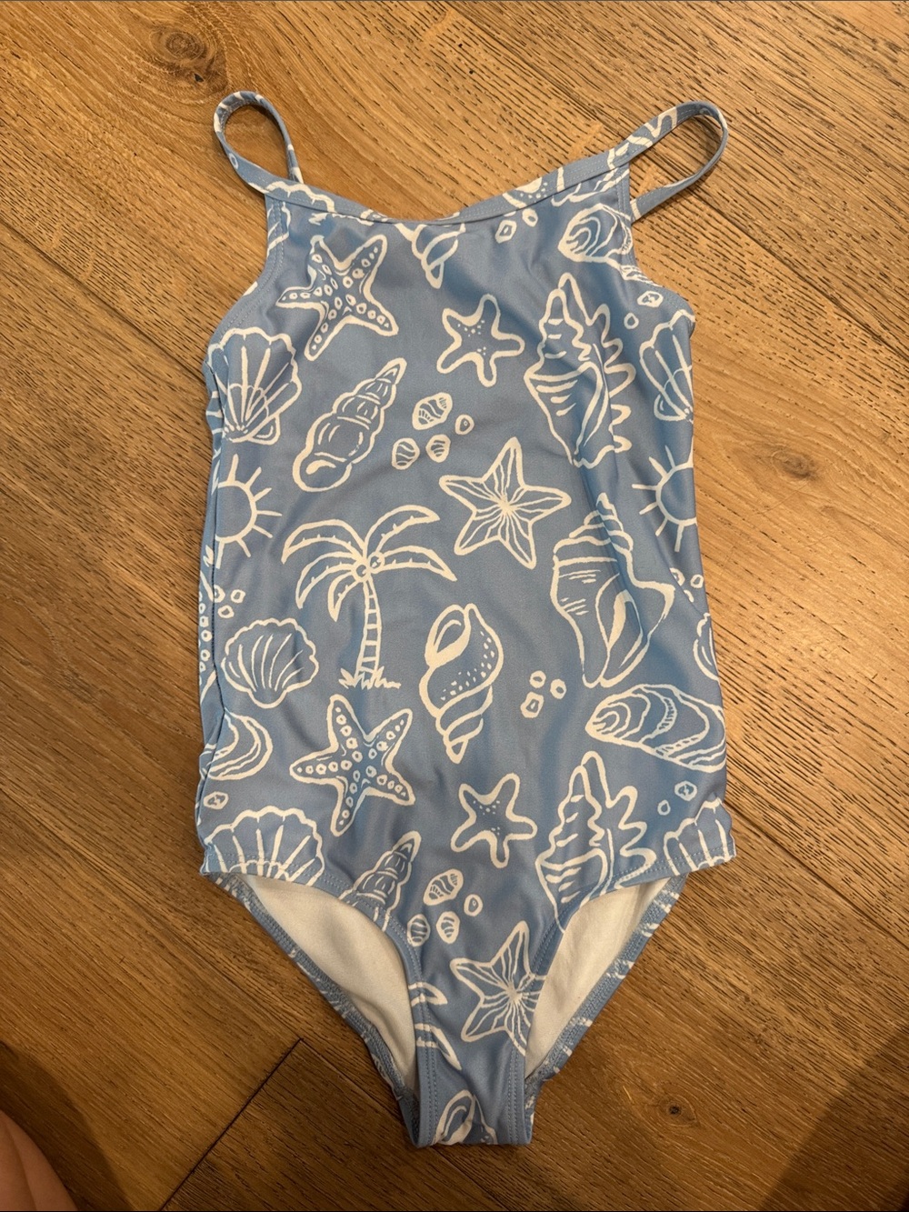H&M Light Blue One-Piece Swimsuit with White Seashell Print